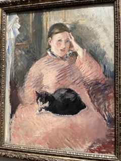猫を抱く女
